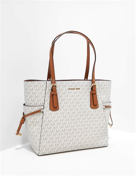 michael kors white signature bag.